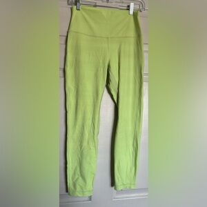 Lululemon Leggings in neon yellow.  Size 8